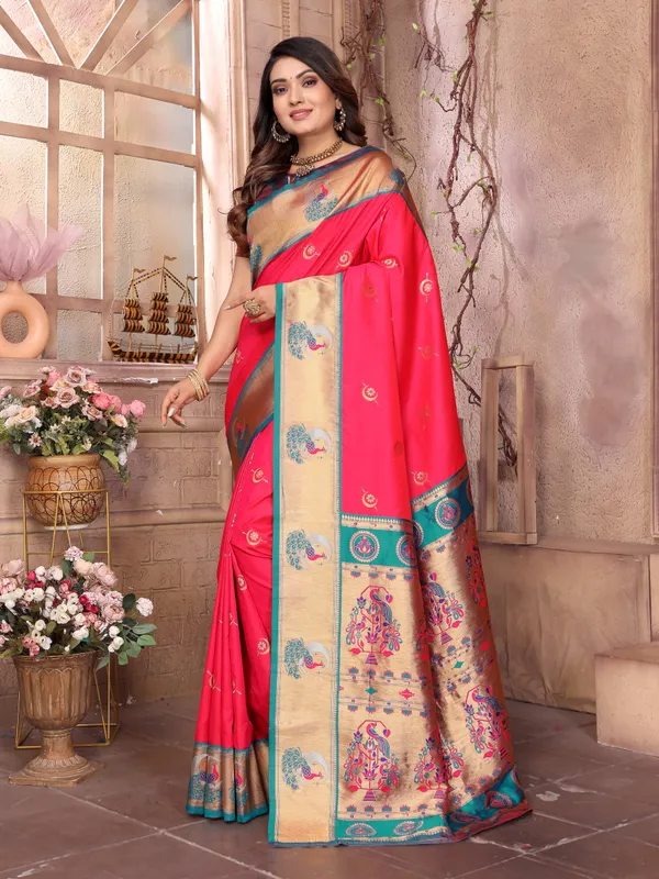 Burnt_Orange_&_Teal_Blue_Vibrant_Silk_Saree_With_Striking_Border_And_Elaborate_Zari_Woven_Motifs