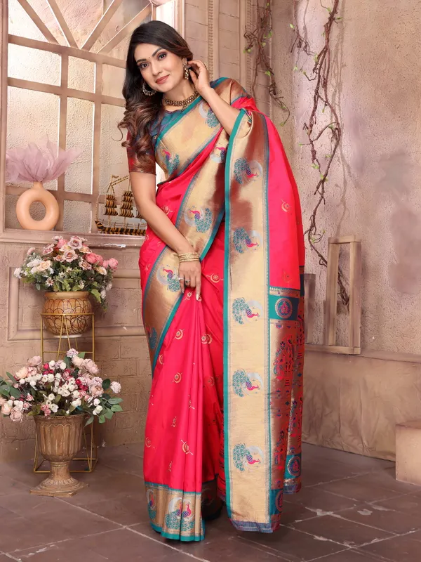 Burnt_Orange_&_Teal_Blue_Vibrant_Silk_Saree_With_Striking_Border_And_Elaborate_Zari_Woven_Motifs