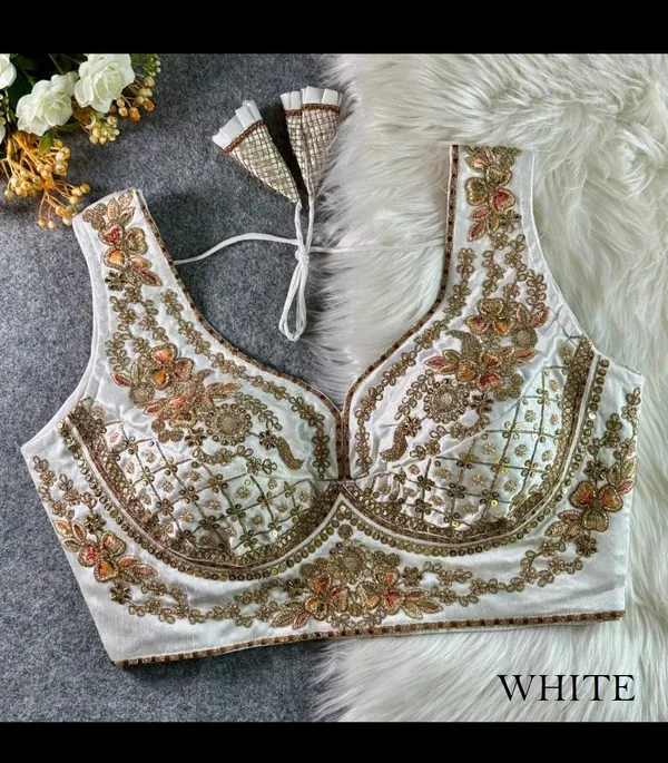 White_Silk_Blouse_with_Intricate_Golden_Zari_and_Sequin_Floral_Embroidery,_Featuring_Stylish_Back_Tassel_Tie-Up_for_a_Regal_Look