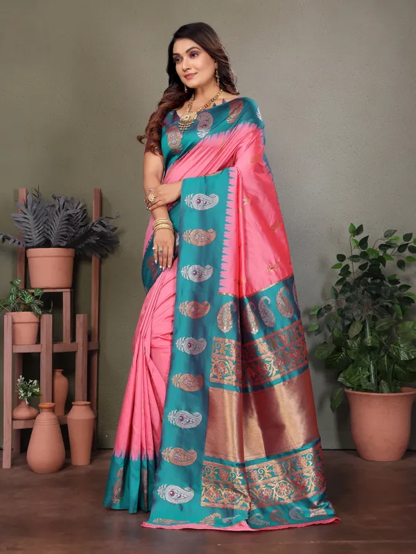 Vibrant_Pink_&_Turquoise_Banarasi_Style_Saree_Featuring_Elegant_Paisley_Motifs