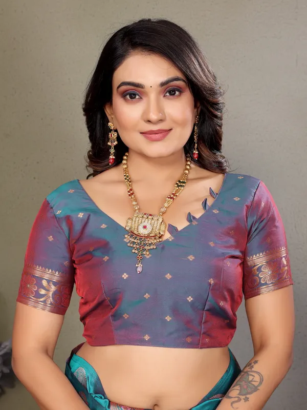 Vibrant_Pink_&_Turquoise_Banarasi_Style_Saree_Featuring_Elegant_Paisley_Motifs