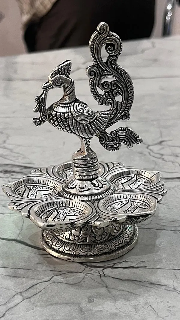 Metal_Lotus_Shaped_Peacock_Diya,_5_Oil_Wick_Diya