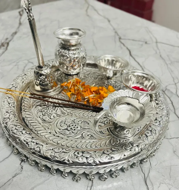 Silver_Plated_Pooja_thali_Set_11_Inch_Plate,_Glass,ganti,kumkum_dibbi,_Diya,_2Bowl,_Agarbatti_Stand_Daily_Puja_Thali_for_Diwali,_Home,_Temple,_Office,_Wedding_Return_Gift_Items