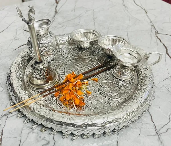 Silver_Plated_Pooja_thali_Set_11_Inch_Plate,_Glass,ganti,kumkum_dibbi,_Diya,_2Bowl,_Agarbatti_Stand_Daily_Puja_Thali_for_Diwali,_Home,_Temple,_Office,_Wedding_Return_Gift_Items