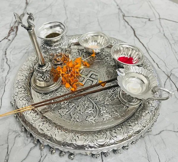 Silver_Plated_Pooja_thali_Set_11_Inch_Plate,_Glass,ganti,kumkum_dibbi,_Diya,_2Bowl,_Agarbatti_Stand_Daily_Puja_Thali_for_Diwali,_Home,_Temple,_Office,_Wedding_Return_Gift_Items