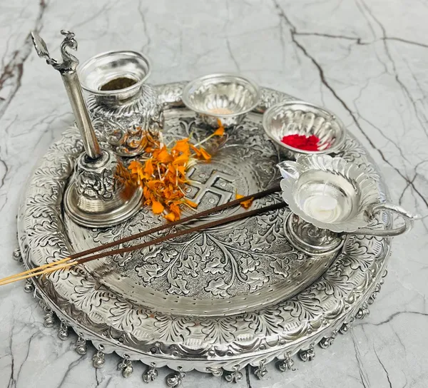 Silver_Plated_Pooja_thali_Set_11_Inch_Plate,_Glass,ganti,kumkum_dibbi,_Diya,_2Bowl,_Agarbatti_Stand_Daily_Puja_Thali_for_Diwali,_Home,_Temple,_Office,_Wedding_Return_Gift_Items