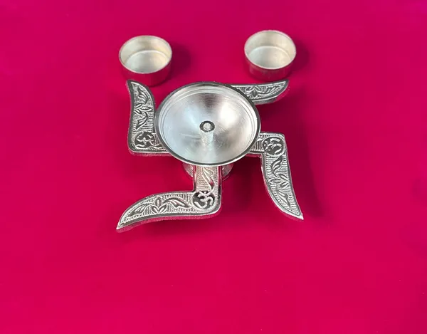 Silver-Toned_Metal_Swastik_Design_Tea_Light_Holder,_Traditional_Engraved_Pattern,Gift_Item