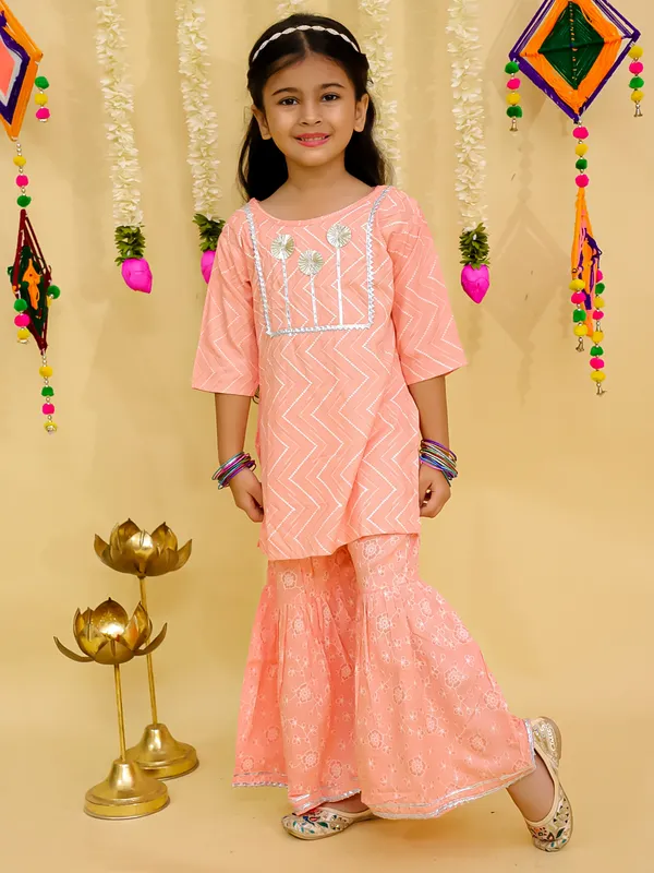 Junitos__Cotton_Woven_Three_Fourth_Sleeves_Floral_Printed_Gota_Lace_Embellished_Kurti_Sharara_Set -Peach