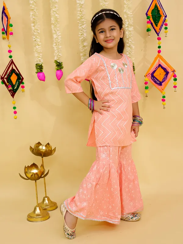 Junitos__Cotton_Woven_Three_Fourth_Sleeves_Floral_Printed_Gota_Lace_Embellished_Kurti_Sharara_Set -Peach
