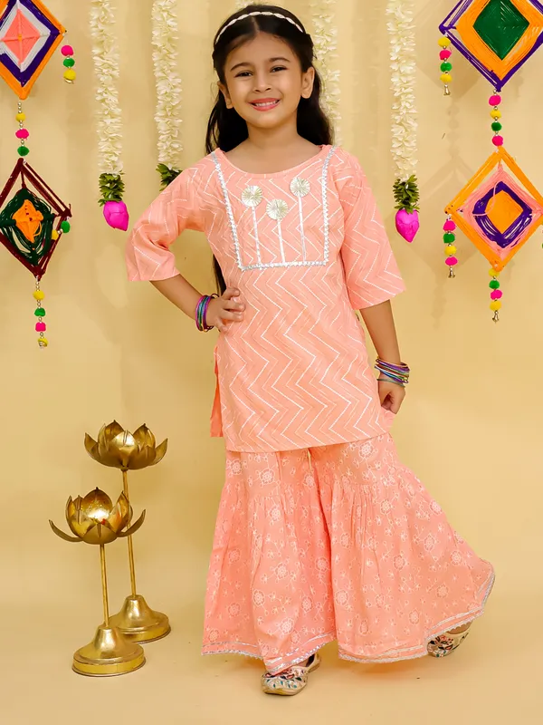 Junitos__Cotton_Woven_Three_Fourth_Sleeves_Floral_Printed_Gota_Lace_Embellished_Kurti_Sharara_Set -Peach