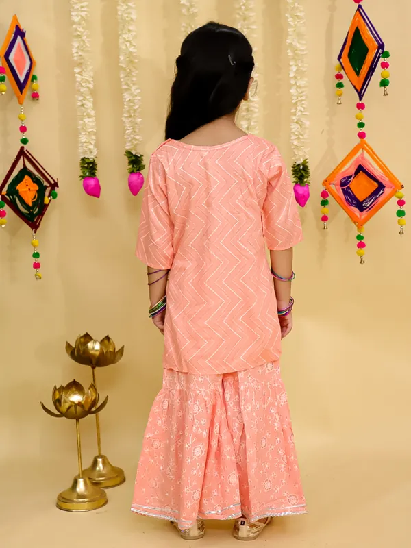 Junitos__Cotton_Woven_Three_Fourth_Sleeves_Floral_Printed_Gota_Lace_Embellished_Kurti_Sharara_Set -Peach