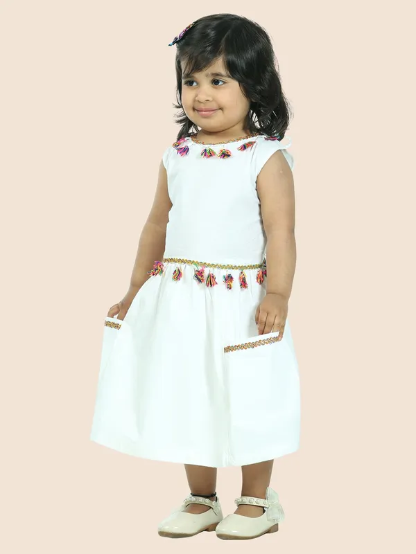 White_Pure_Cotton_Sleeveless_Dress_Embellished_With_Tussle