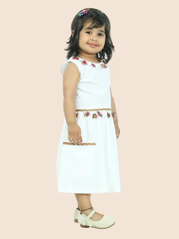 White_Pure_Cotton_Sleeveless_Dress_Embellished_With_Tussle