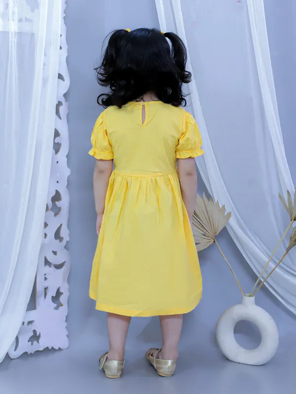 Yellow_Pure_Cotton_Smoked_Dress_With_Peter_Pan_Collar