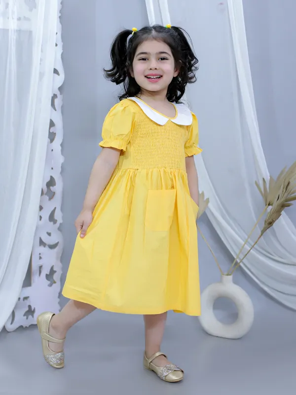 Yellow_Pure_Cotton_Smoked_Dress_With_Peter_Pan_Collar