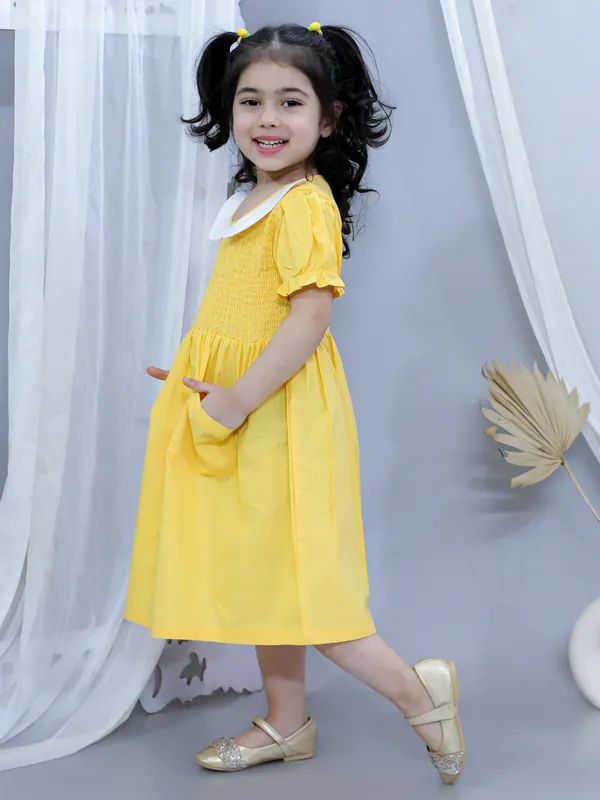 Yellow_Pure_Cotton_Smoked_Dress_With_Peter_Pan_Collar