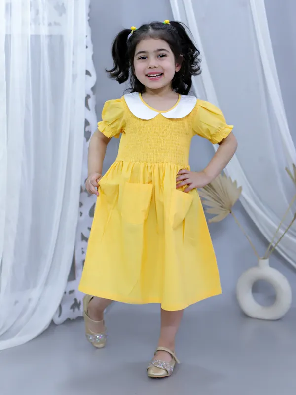 Yellow_Pure_Cotton_Smoked_Dress_With_Peter_Pan_Collar