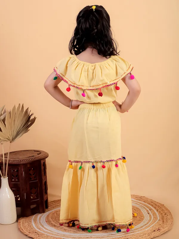 Yellow_Pure_Cotton_Crop_Top_And_Long_Skirt_Embellished_With_Pompom_Tussal