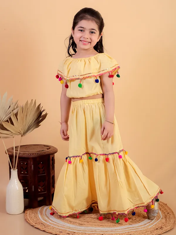 Yellow_Pure_Cotton_Crop_Top_And_Long_Skirt_Embellished_With_Pompom_Tussal