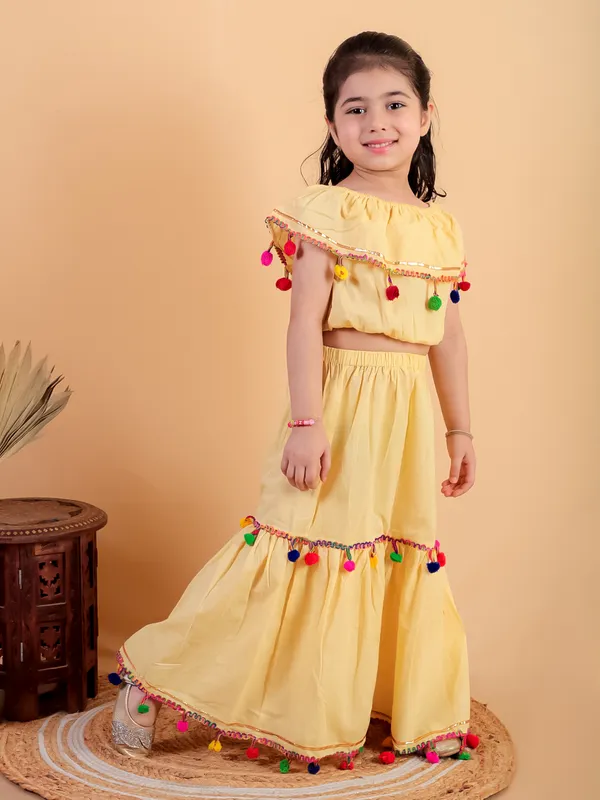 Yellow_Pure_Cotton_Crop_Top_And_Long_Skirt_Embellished_With_Pompom_Tussal