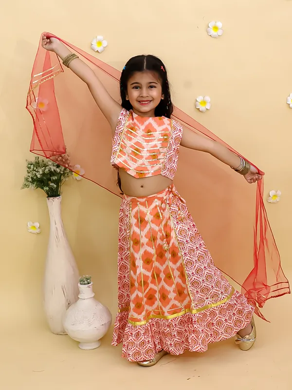 Junitos_Cotton_Woven_Sleeveless_Floral_Printed_Lehenga_Choli_with_Dupatta_-Orange