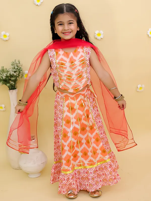 Junitos_Cotton_Woven_Sleeveless_Floral_Printed_Lehenga_Choli_with_Dupatta_-Orange