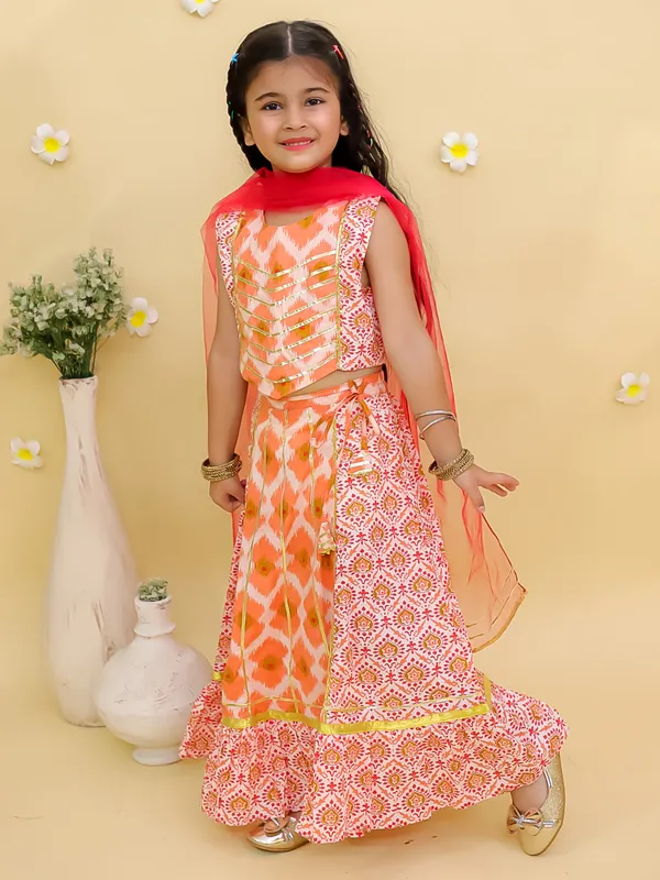 Junitos_Cotton_Woven_Sleeveless_Floral_Printed_Lehenga_Choli_with_Dupatta_-Orange