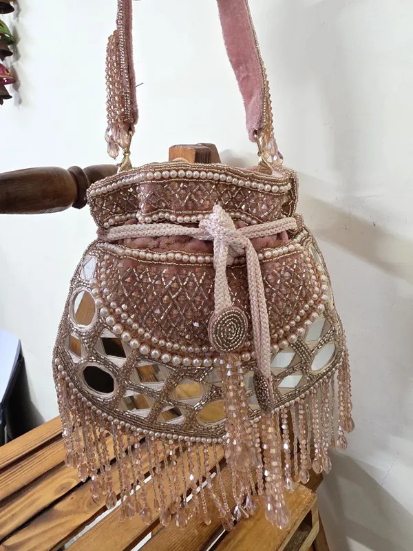 Ivory_Mirror_Work_Potli_Bag