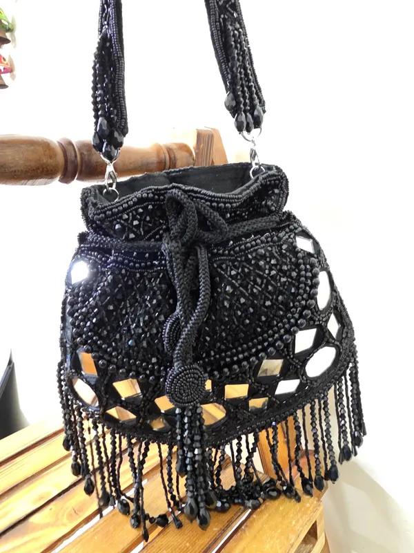 Ivory_Mirror_Work_Potli_Bag