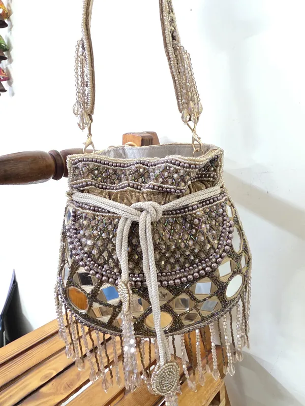Ivory_Mirror_Work_Potli_Bag