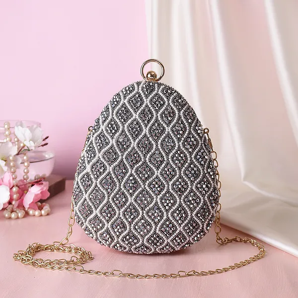 Multicolor_Heavy_Design_Almond_Shape_Clutch_With_Bangle_Lock