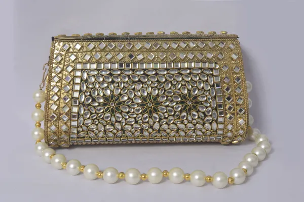 Gold_Velkira_Luxe_Kundan_Clutch_With_Gold_Polish,_Green_Stones,_And_Pearl_Chain