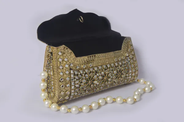 Gold_Velkira_Luxe_Kundan_Clutch_With_Gold_Polish,_Green_Stones,_And_Pearl_Chain