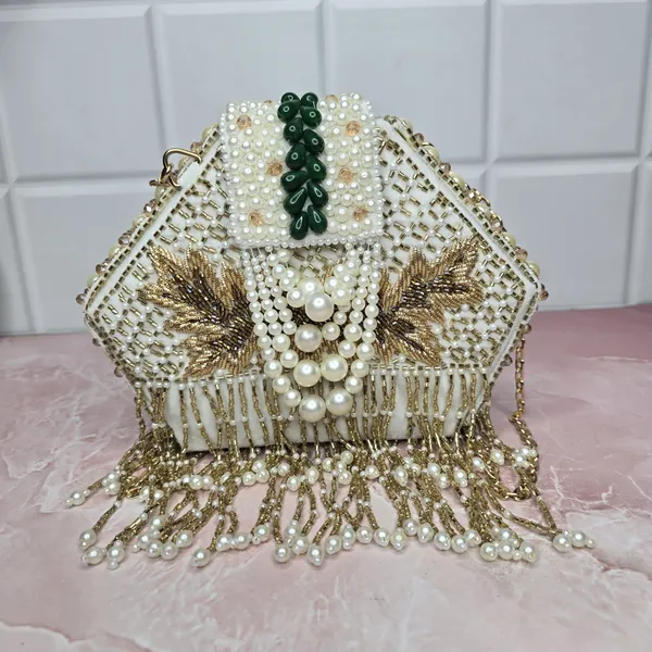 Pearl_&_Beaded_Bridal_Clutch_–_Handcrafted_Hexagon_Potli_with_Golden_Fringe_by_Zayra