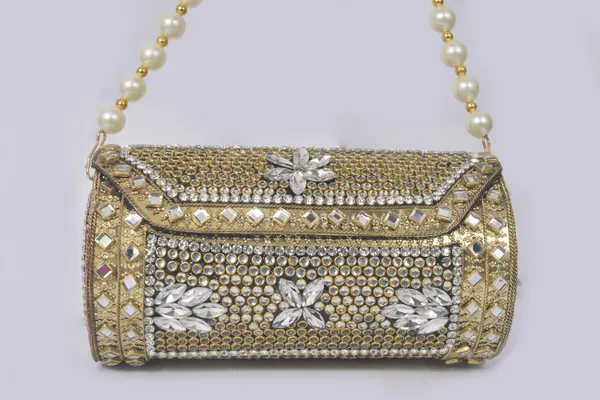 Gold_Traditional_Kundan_Embellished_Clutch_With_Green_Gemstone_And_Pearl_Handle_Design