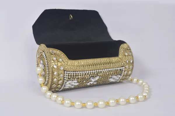 Gold_Traditional_Kundan_Embellished_Clutch_With_Green_Gemstone_And_Pearl_Handle_Design