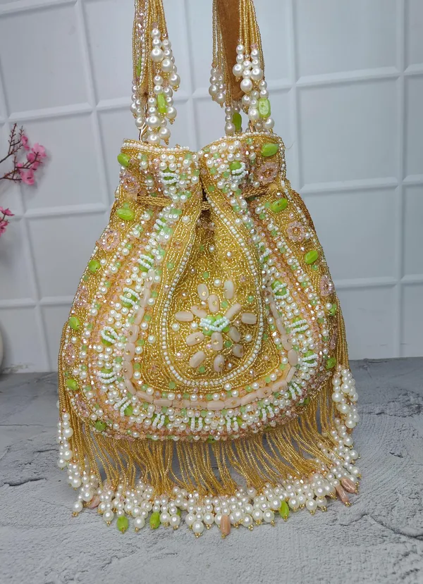 Multicolor_Royal_Bloom_Potli_Traditional_Green-Gold_Beaded_Bag_With_Floral_Work,_Pearls,_And_Vibrant_Hangings