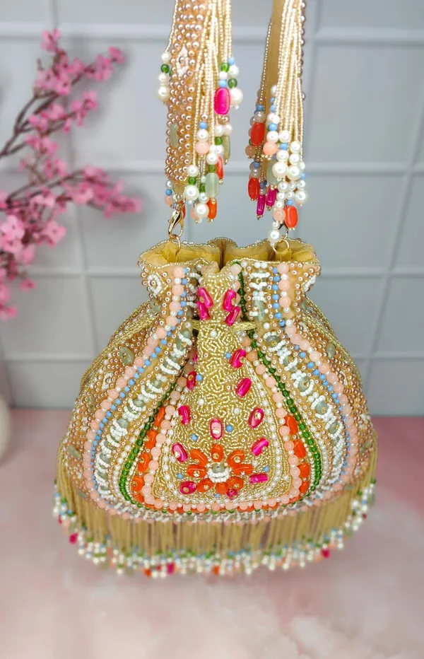 Multicolor_Royal_Bloom_Potli_Traditional_Green-Gold_Beaded_Bag_With_Floral_Work,_Pearls,_And_Vibrant_Hangings