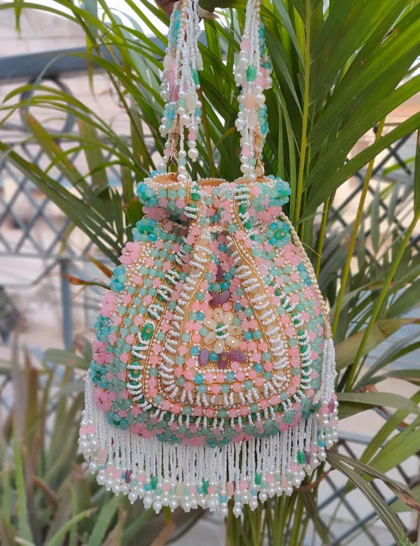 Multicolor_Royal_Bloom_Potli_Traditional_Green-Gold_Beaded_Bag_With_Floral_Work,_Pearls,_And_Vibrant_Hangings