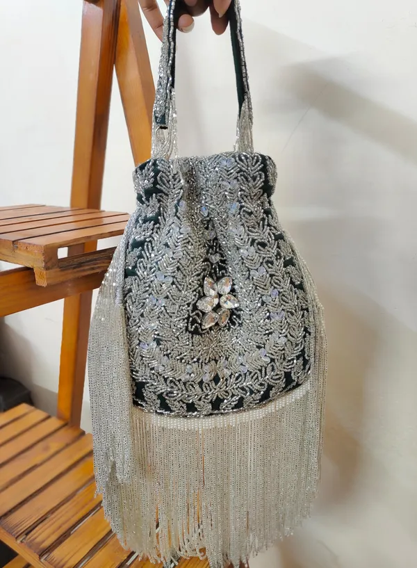 Blue_And_Silver_Elegant_Embellished_Designer_Potli_With_Intricate_Beadwork_And_Fringed_Detailing_For_Women