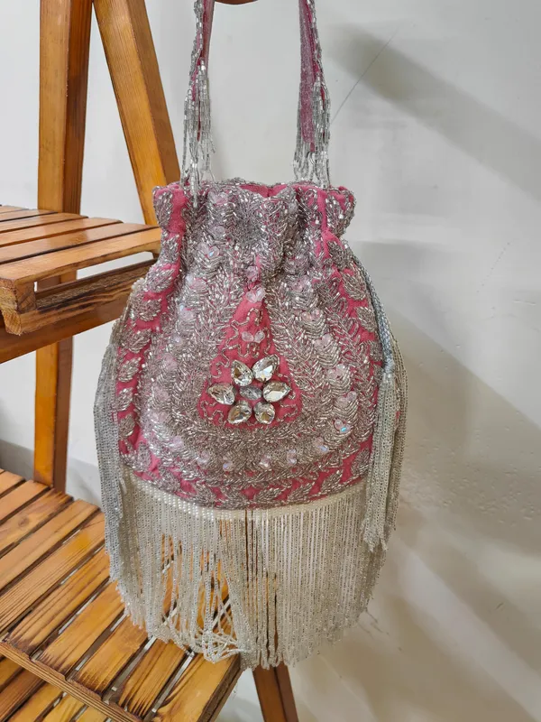 Red_And_Silver_Elegant_Embellished_Designer_Potli_With_Intricate_Beadwork_And_Fringed_Detailing_For_Women