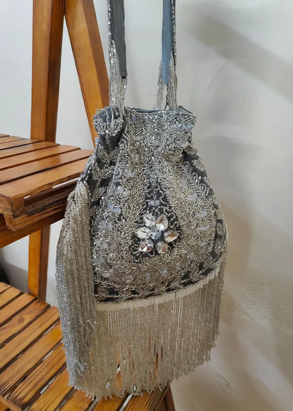 Blue_And_Silver_Elegant_Embellished_Designer_Potli_With_Intricate_Beadwork_And_Fringed_Detailing_For_Women