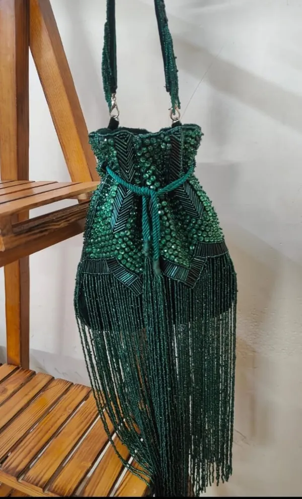 Multicolor_Elegant_Beaded_Embellished_Traditional_Potli_With_Fringe_For_Weddings,_Parties,_And_Festive_Events