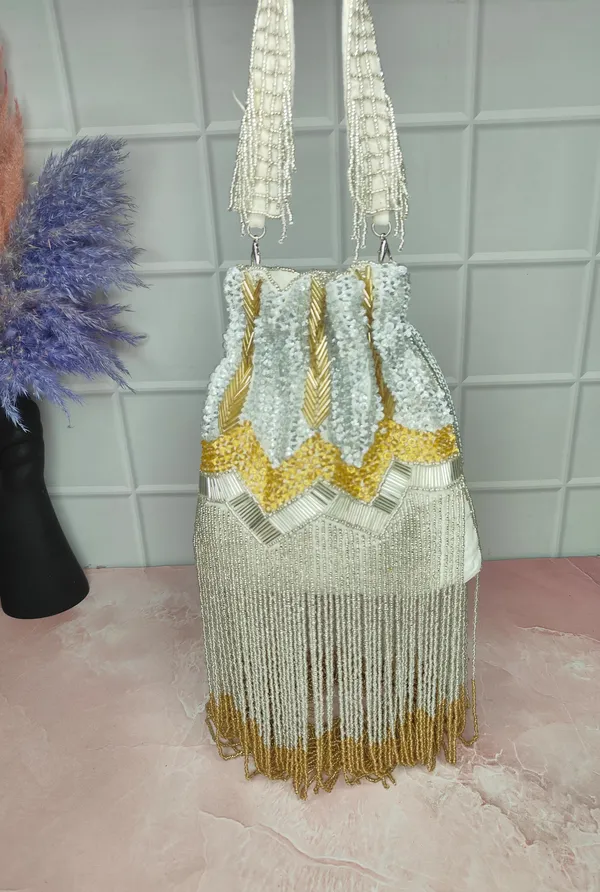 Multicolor_Elegant_Beaded_Embellished_Traditional_Potli_With_Fringe_For_Weddings,_Parties,_And_Festive_Events