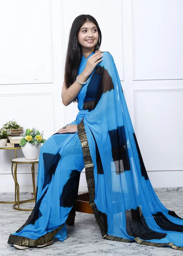 Sky_Blue_Silk_Trendy_Checked_Shibori_Tie_And_Dye_Chiffon_Sarees_For_Women
