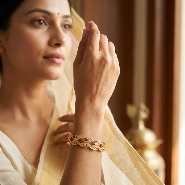 The_Aura_Leaf_Wave_Bangles_(Set_of_2)_�_Matte_Gold_with_Ruby_Accentuation