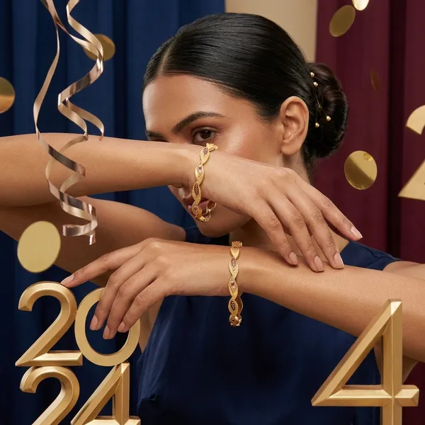 The_Aura_Leaf_Wave_Bangles_(Set_of_2)_�_Matte_Gold_with_Ruby_Accentuation