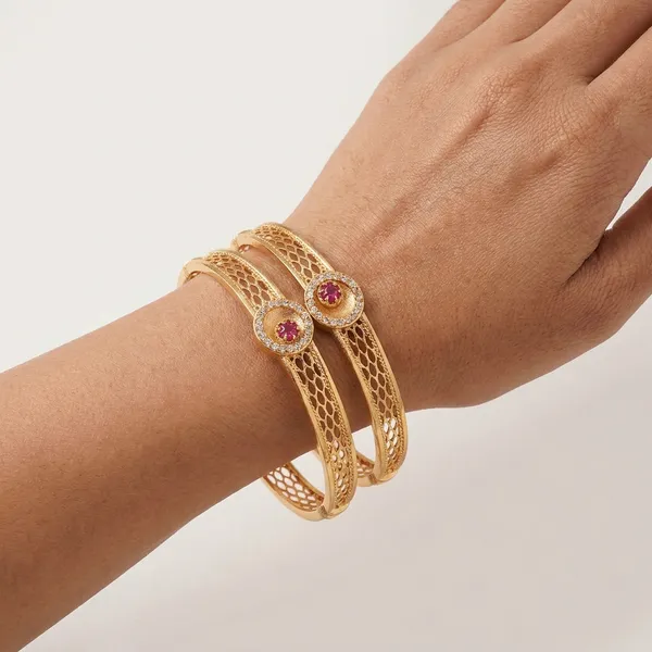 The_Royal_Filigree_Cuff_Set_�__Gold_Plated_Openwork_Bangles_with_Faux_Ruby_&_CZ_Medallions_(Set_of_2)