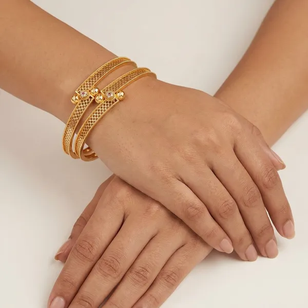 The_Aura_Filigree_Bangle_Set_(Set_of_2)_�_Handcrafted_Gold_Kada_with_Ruby_Accents