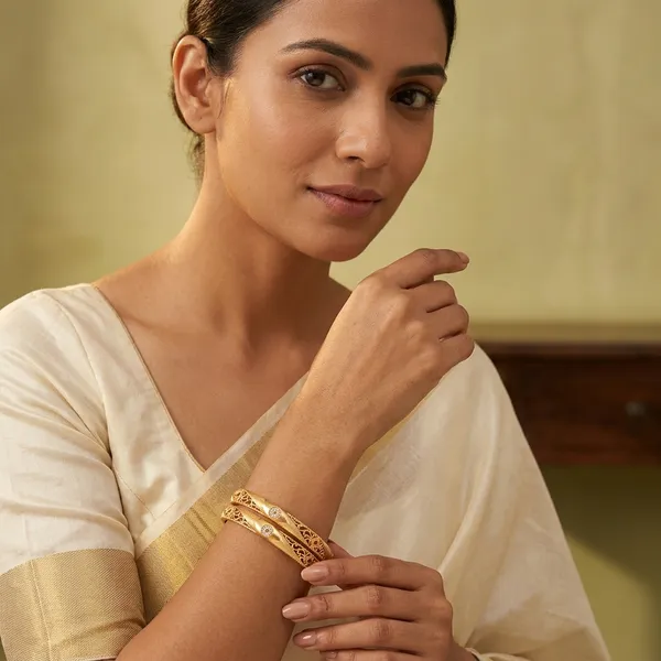 Elegant_Brass_Gold-Plated_Daily_Wear_Bangles_with_Intricate_Filigree_&_Stone_Accents_(Set_of_2)